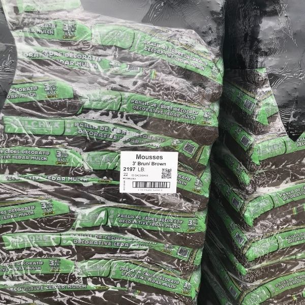 pallet of bagged brown cedar mulch at the Bay Landscaping nursery