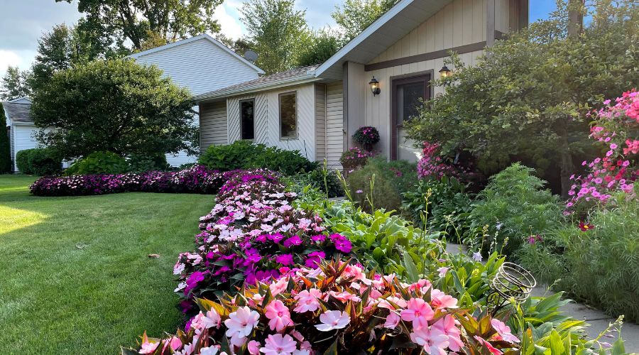 Garden with rows of flowers and shrubs by Bay Landscaping. What shape should my shrubs be?